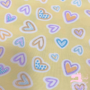 ALGODÓ LICRADO DISEÑO CORAZÓN GLITTER ÁMBAR