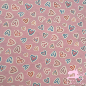 ALGODÓN LICRADO DISEÑO CORAZÓN GLITTER ROSADO